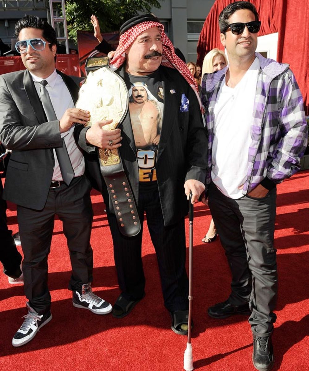 The Iron Sheik (center) with guests