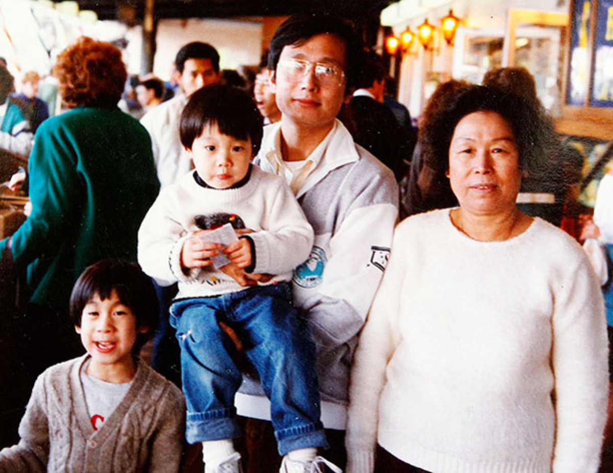 A young Lin (center) poses with his family. (Reuters)