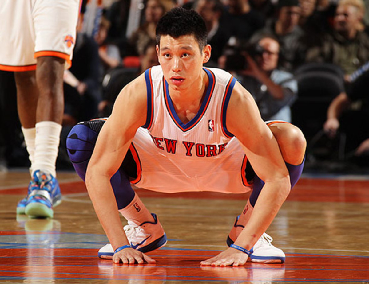 Lin takes a rest during a 2012 Knicks-Nets game. (Nathaniel S. Butler/Getty Images)