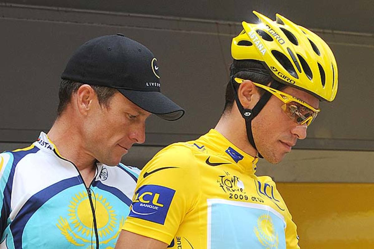Alberto Contador and Lance Armstrong leave the signature ceremony