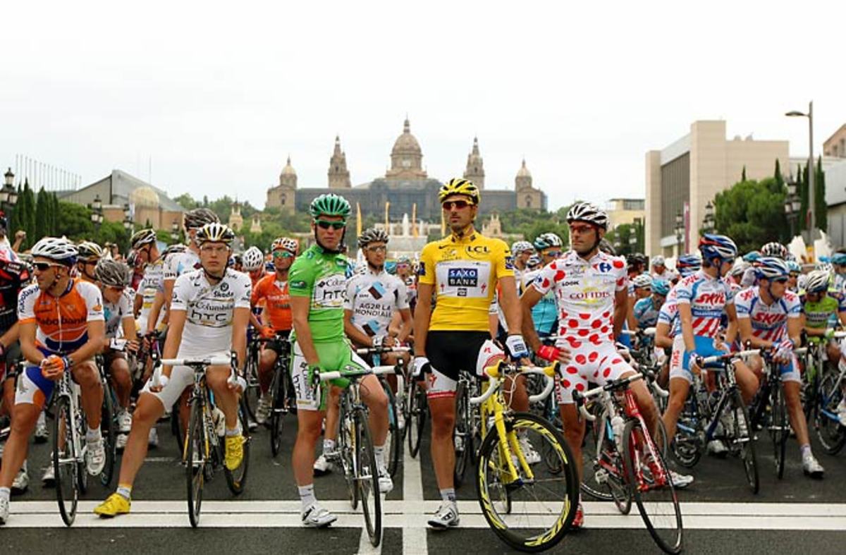 Riders prepare to start during stage seven