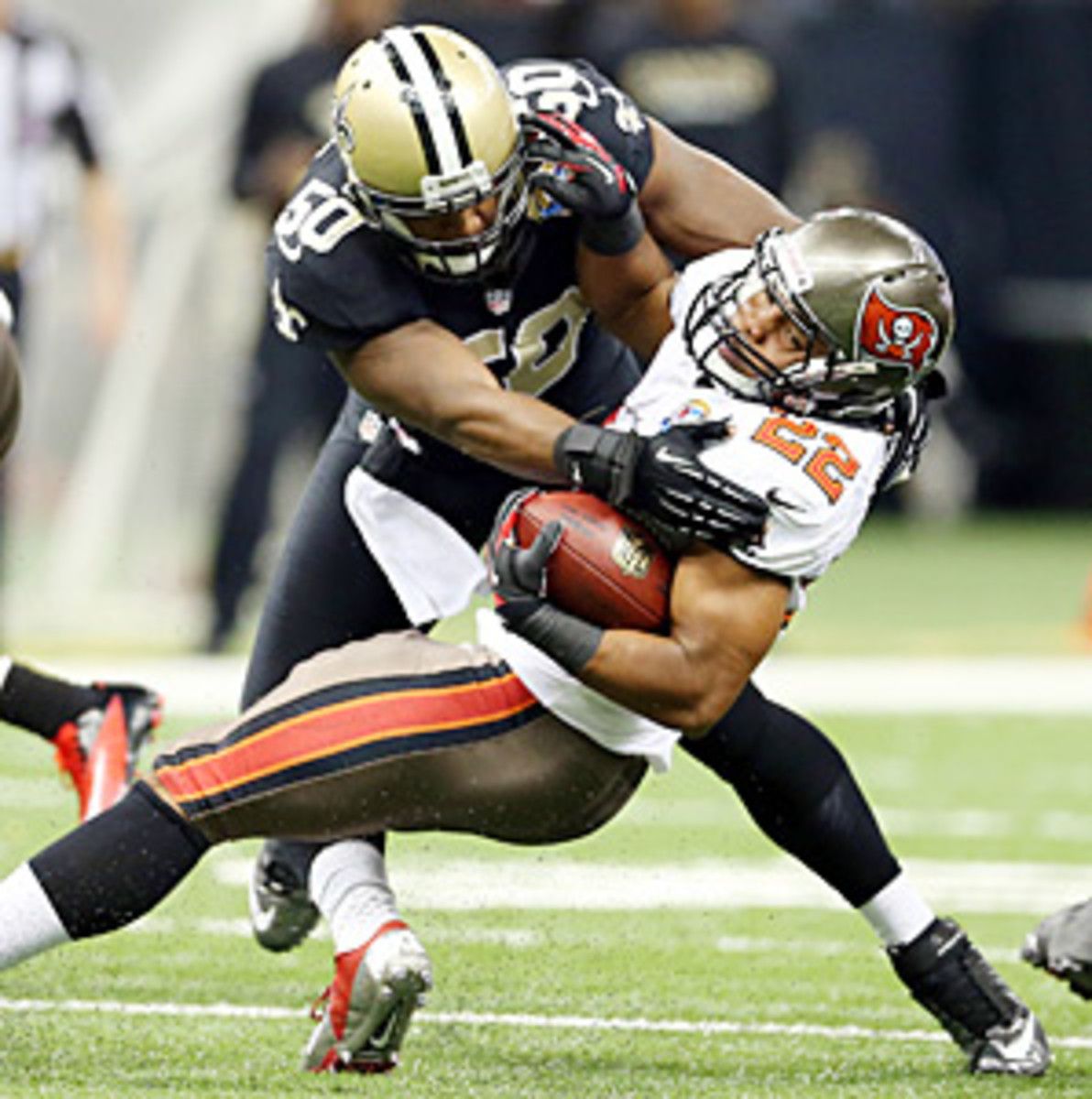 Doug Martin (22) carried the ball a measly nine times for 16 yards against the Saints.