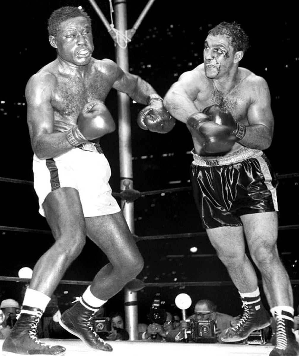 Rocky Marciano retires at 49-0