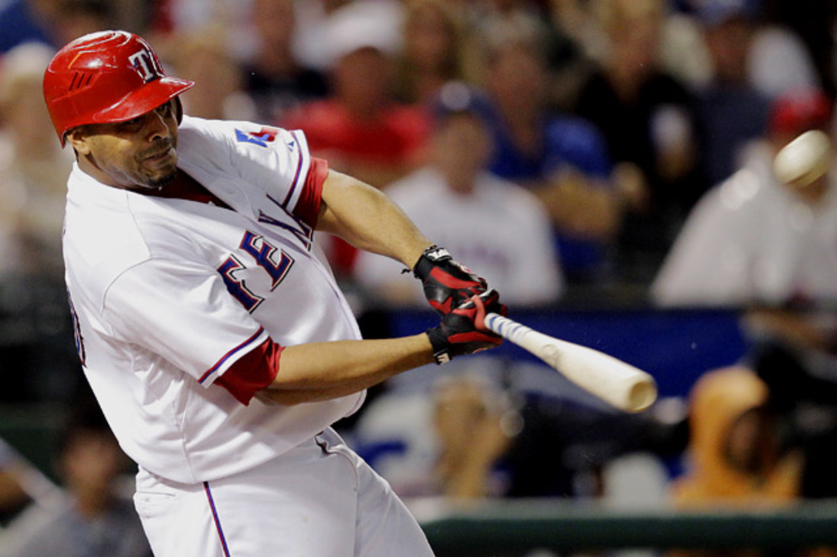 Texas stays with struggling Nelson Cruz