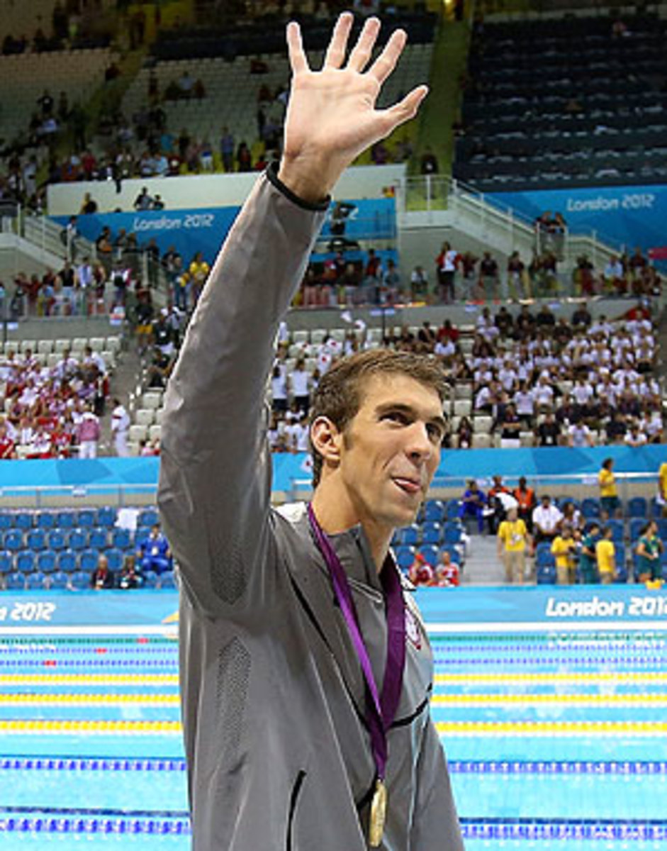 Michael Phelps waves goodbye at the end of his storied Olympic swimming career.