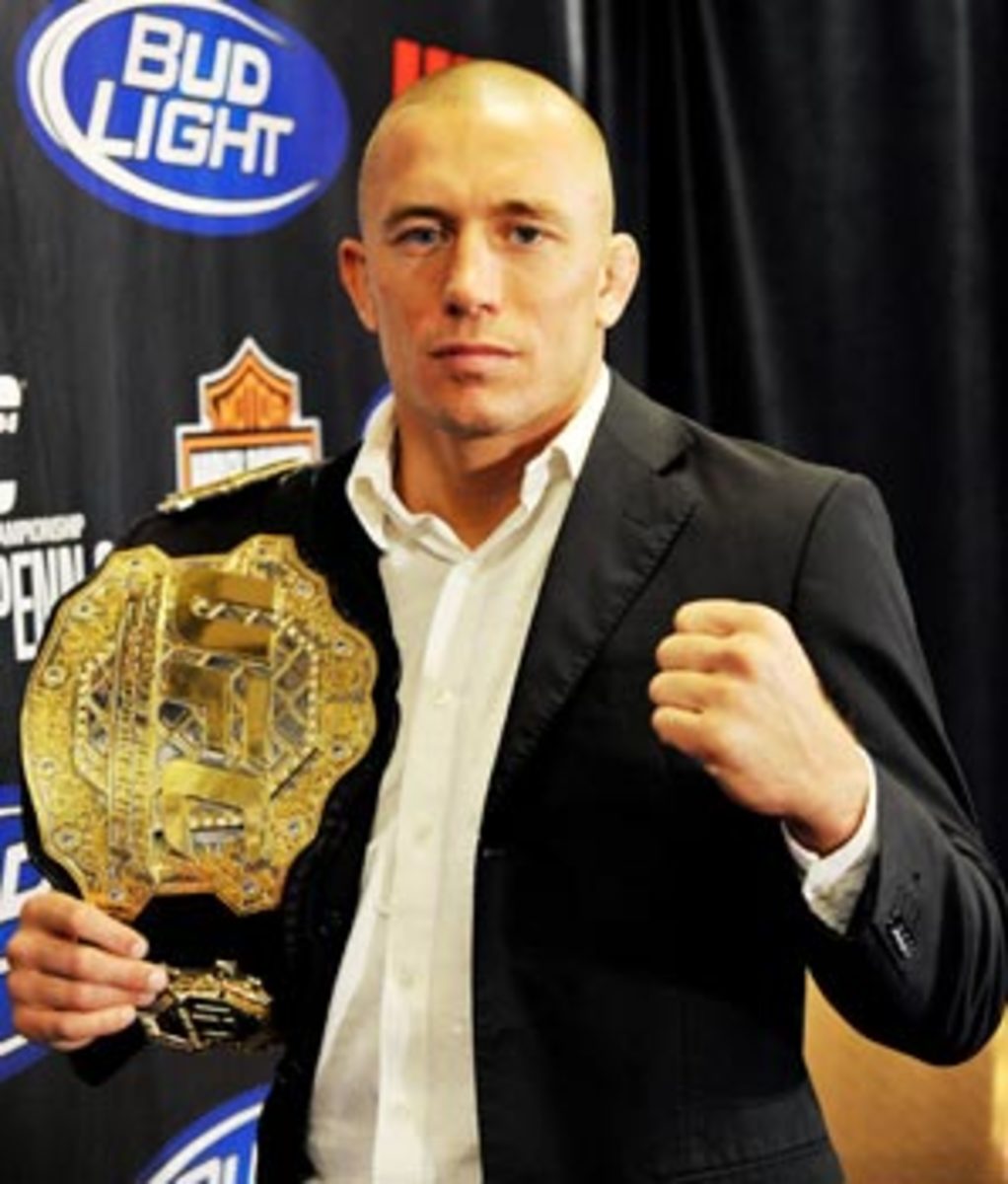 Photo: Elon Musk, Georges St-Pierre pose after apparent MMA training