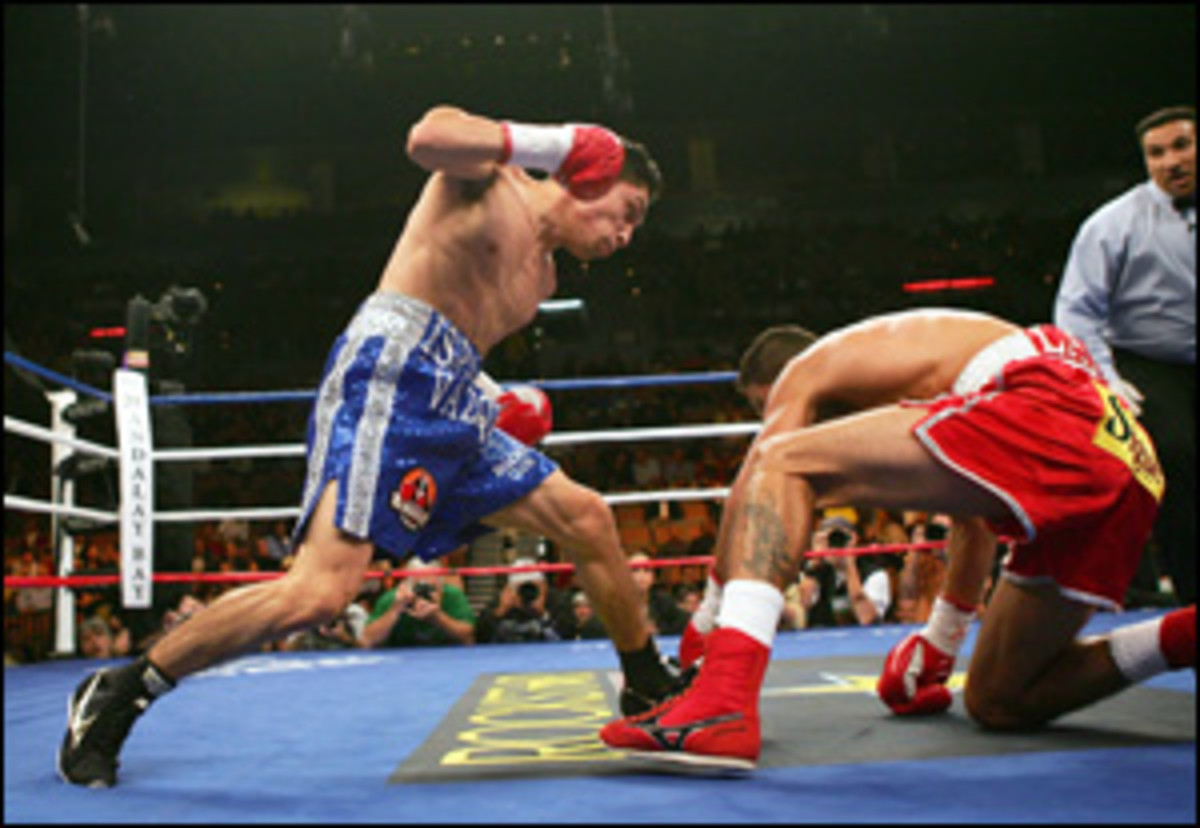 Luis Fernando Llosa: Israel Vazquez has overcome numous hurdles become the WBC bantamweight champion. - Sports Illustrated