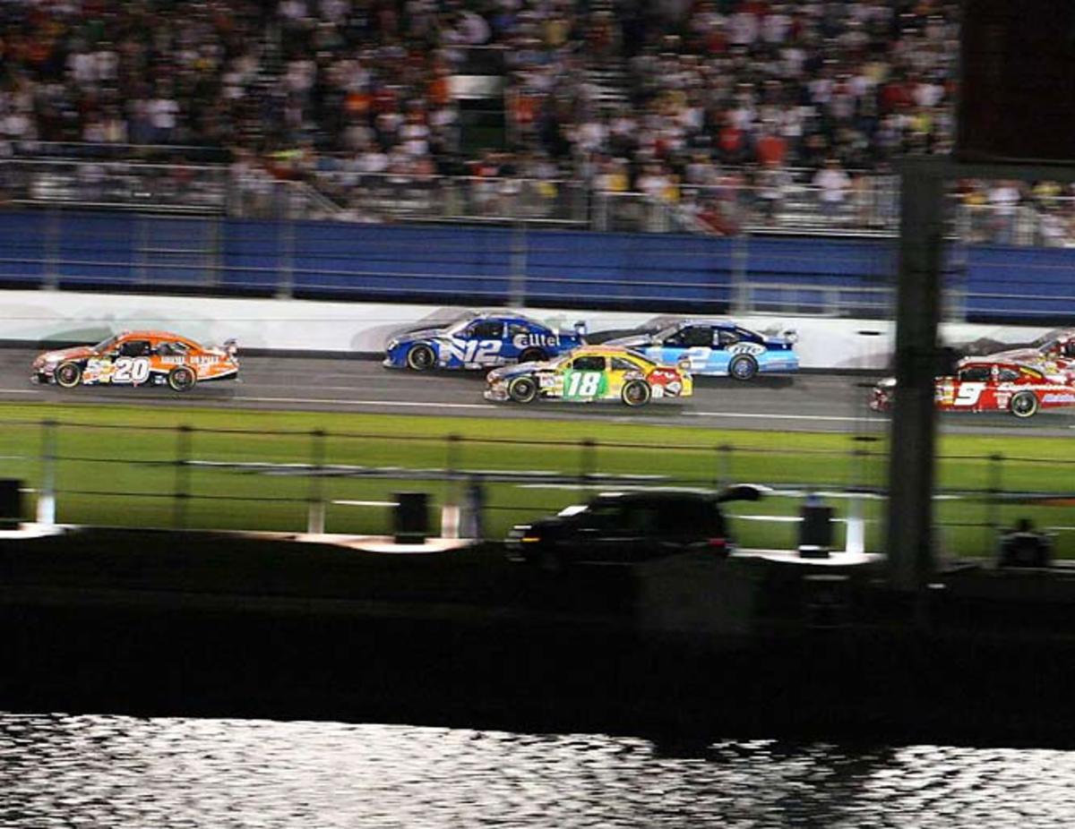 Ryan Newman gets the bump-draft from Kurt Busch.