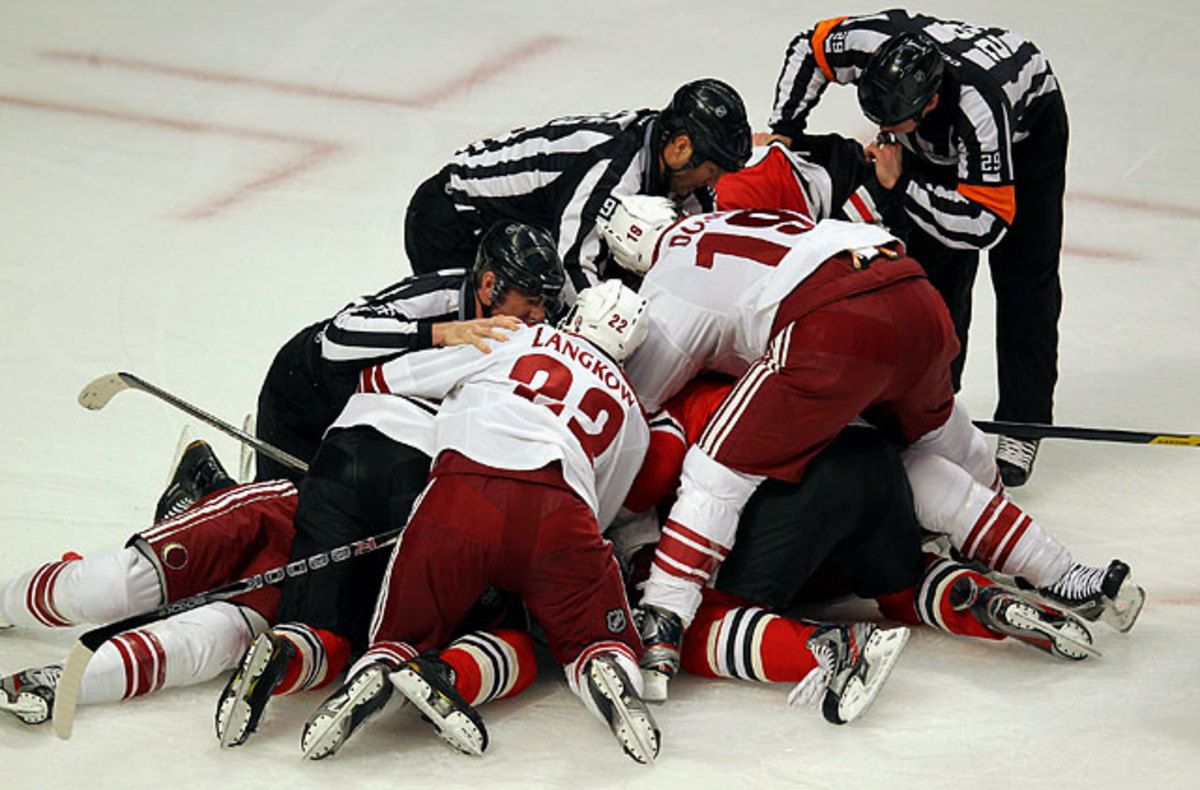 coyotes-blackhawks-scrum.jpg