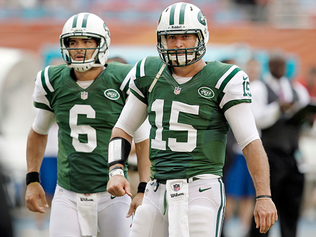 121218183806-tim-tebow-mark-sanchez-single-image-cut.jpg