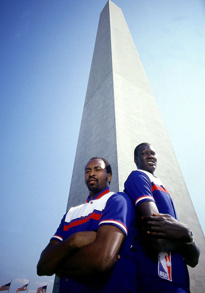 Moses Malone and Manute Bol