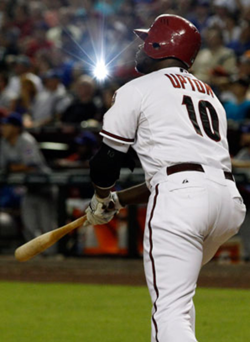 Justin Upton is in the trade spotlight once again, this time as part of a multi-team deal. (AP)