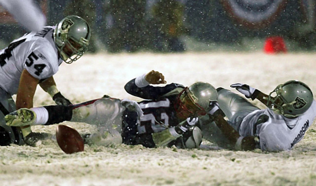 tom-brady-charles-woodson-tuck-rule%282%29.jpg