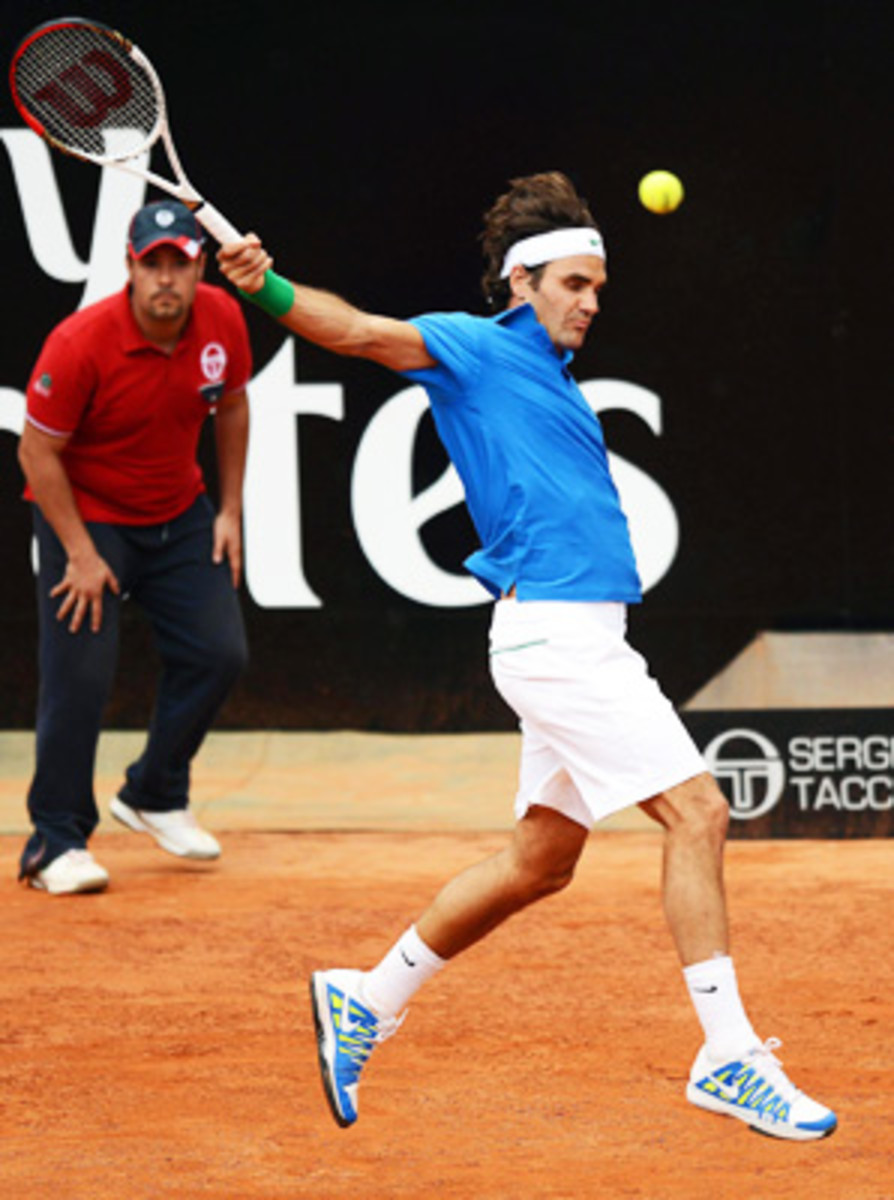 Roger Federer opened his Italian Open campaign strong with a 6-3, 6-4 win over Carlos Berlocq.