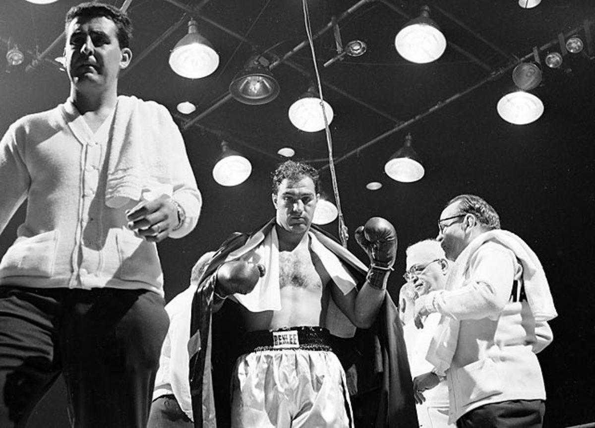 Rocky Marciano knocks out Jersey Joe Walcott