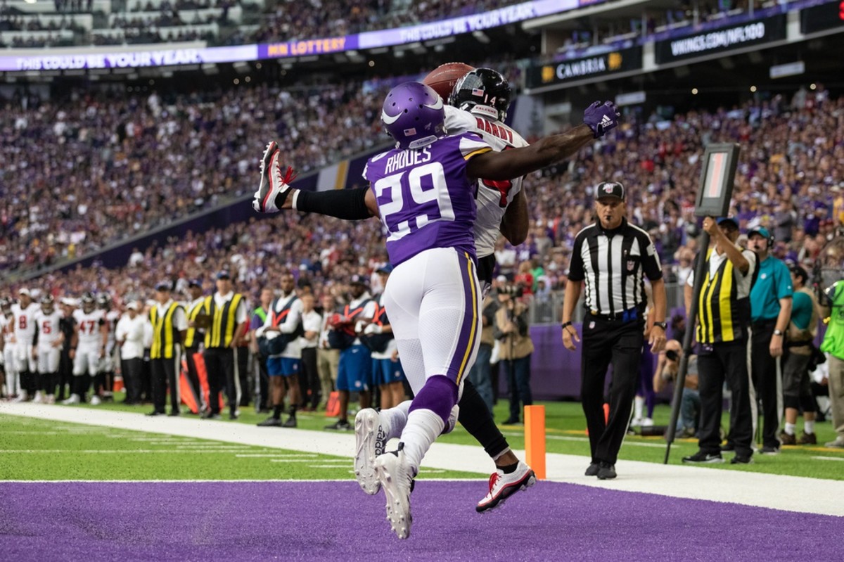 Minnesota Vikings cornerback Xavier Rhodes (29) breaks up a two point conversion intended for Atlanta Falcons wide receiver Justin Hardy (14) during the fourth quarter at U.S. Bank Stadium.