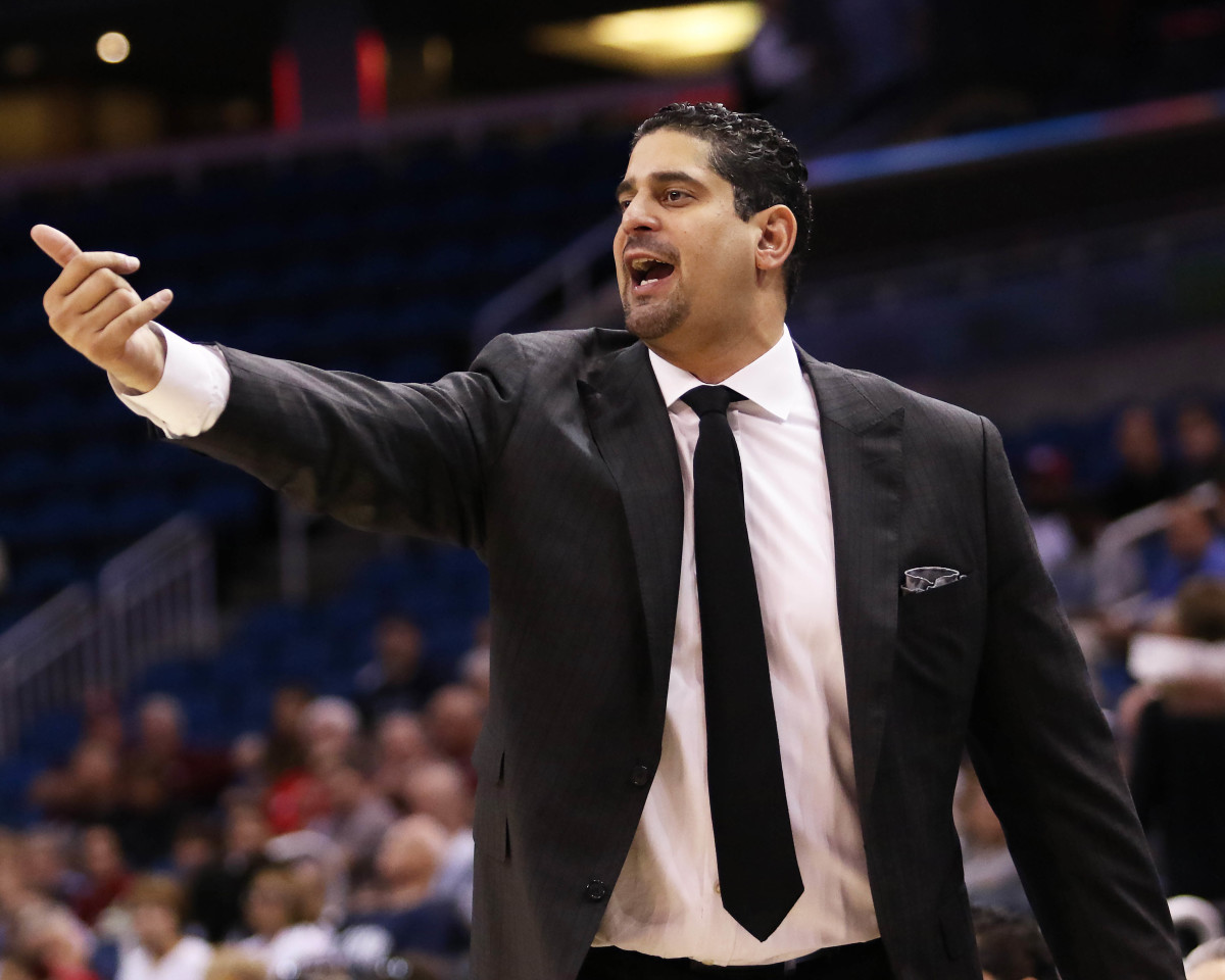 South Florida Bulls coach Orlando Antigua reacts from the bench in the first half against the Temple Owls during the AAC Tournament at the Amway Center.