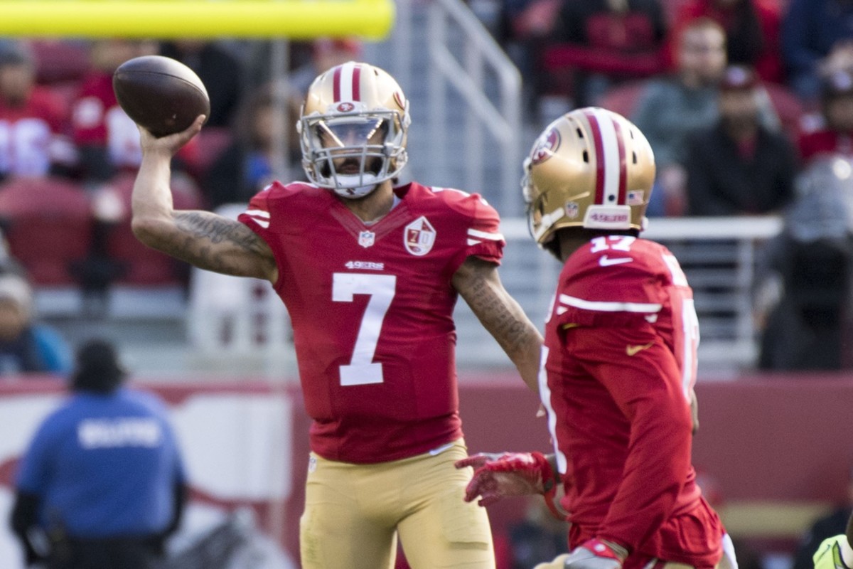 San Francisco 49ers quarterback Colin Kaepernick (7) passes the football to wide receiver Jeremy Kerley (17) against the Seattle Seahawks during the first quarter at Levi's Stadium.