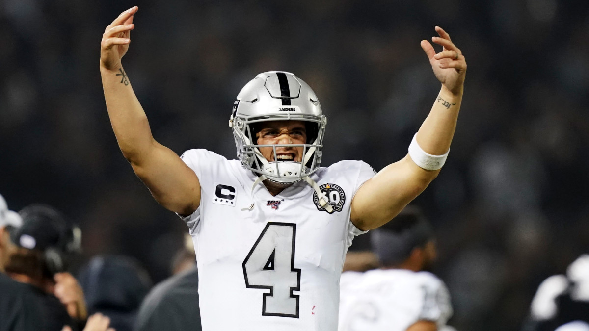 November 7, 2019; Oakland, CA, USA; Oakland Raiders quarterback Derek Carr (4) interacts with the fans during the fourth quarter against the Los Angeles Chargers at Oakland Coliseum. Mandatory Credit: Kyle Terada-USA TODAY Sports