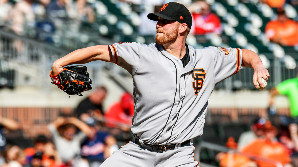 Sep 22, 2019; Atlanta, GA, USA; San Francisco Giants relief pitcher Will Smith (13) pitches against the Atlanta Braves during the ninth inning at SunTrust Park. Mandatory Credit: Dale Zanine-USA TODAY Sports