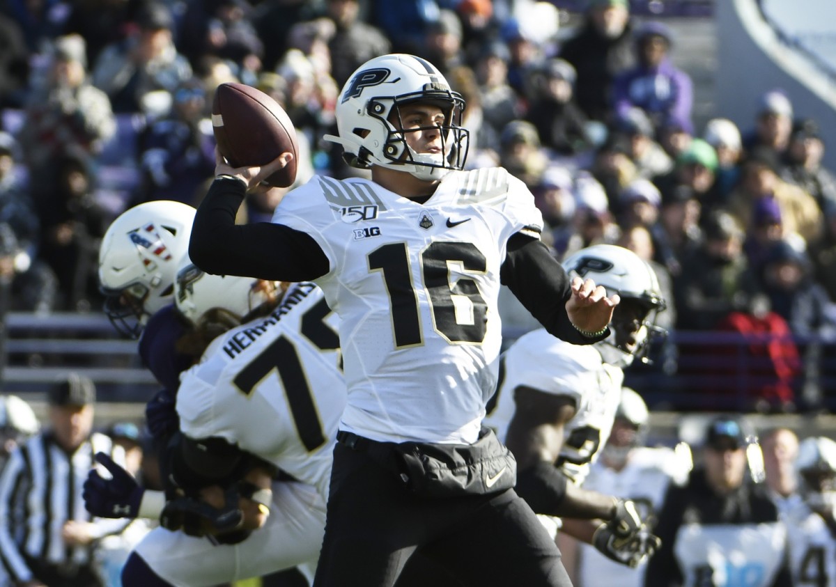 Evanston, IL, USA; Purdue Boilermakers quarterback Aidan O'Connell (16) passes against the Northwestern Wildcats during the first quarter at Ryan Field. Mandatory Credit: David Banks-USA TODAY Sports