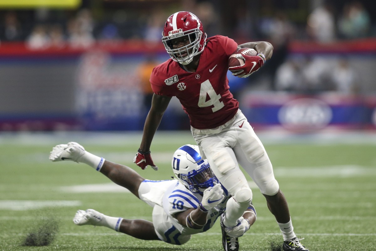 Alabama Crimson Tide wide receiver Jerry Jeudy (4) runs past Duke Blue Devils safety Marquis Waters (10) in the third quarter at Mercedes-Benz Stadium.