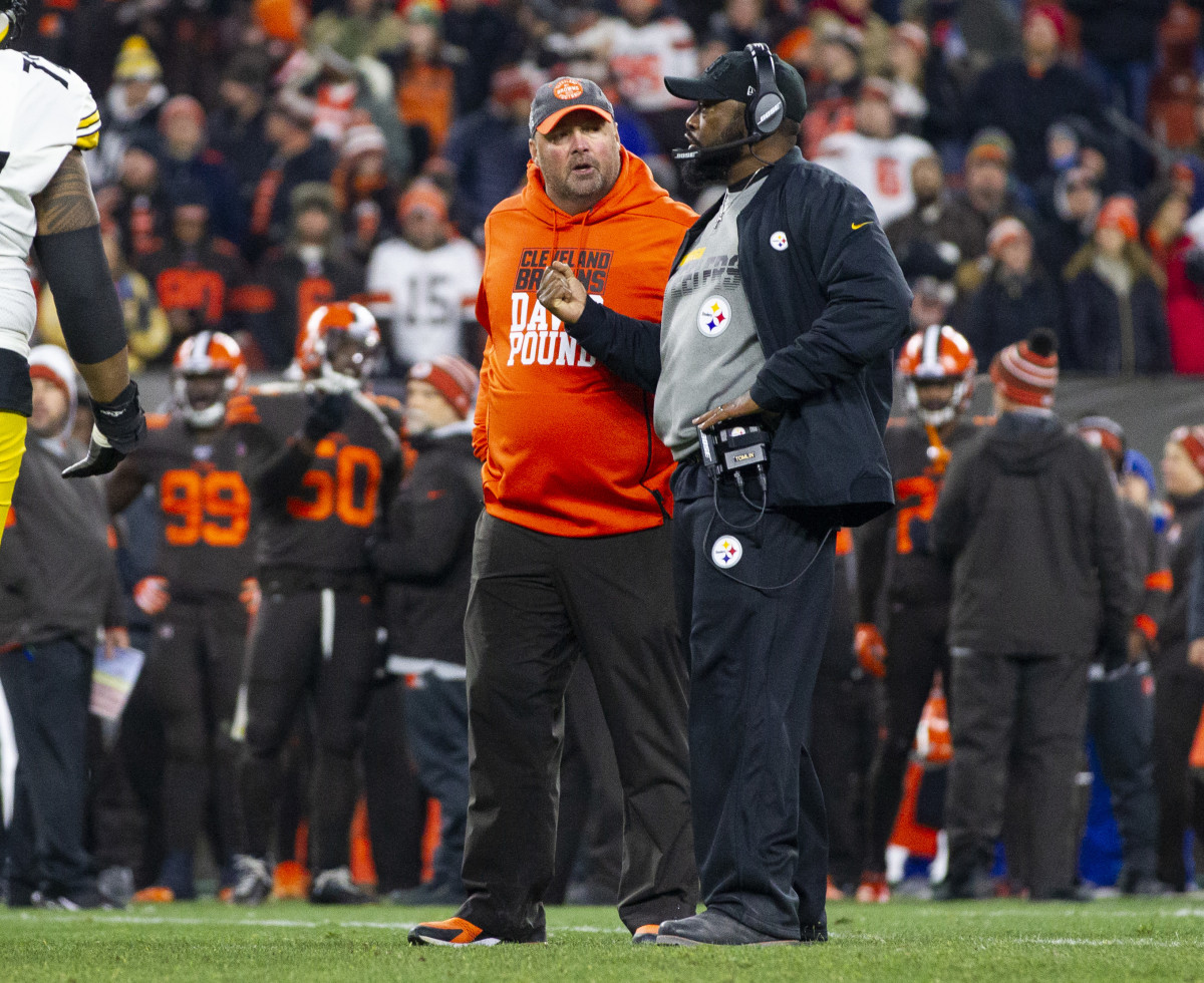 Nov 14, 2019; Cleveland, OH, USA; Cleveland Browns head coach Freddie Kitchens and Pittsburgh Steelers head coach Mike Tomlin talk as the officials discern the details of a fight that happened on the field in the final seconds of the fourth quarter at FirstEnergy Stadium. The Browns won 21-7. Mandatory Credit: Scott R. Galvin-USA TODAY Sports