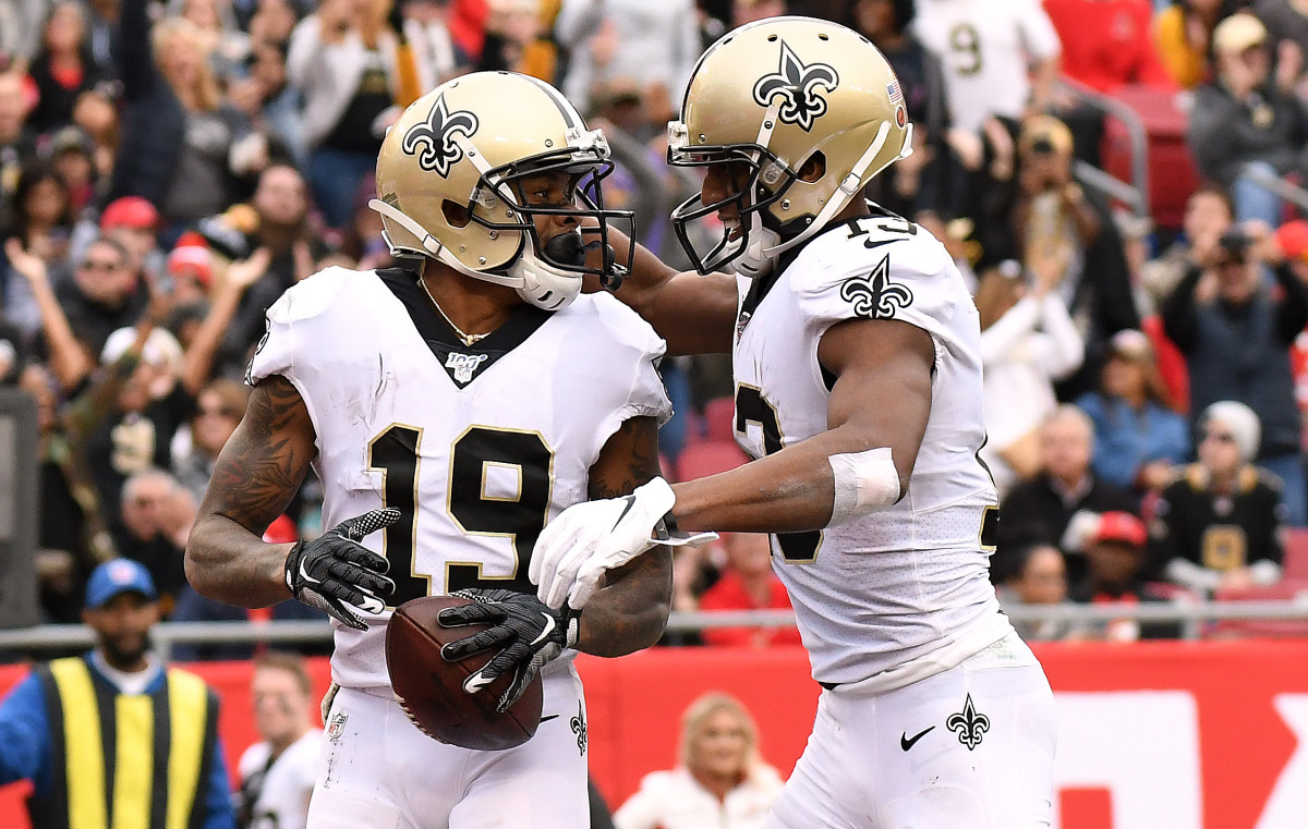 Nov 17, 2019; Tampa, FL, USA; New Orleans Saints wide receiver Ted Ginn Jr. (19) and wide receiver Michael Thomas (13) celebrate after a touchdown against the Tampa Bay Buccaneers in the second half at Raymond James Stadium. Mandatory Credit: Jonathan Dyer-USA TODAY Sports