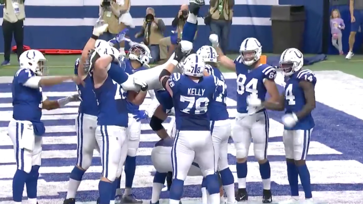 Colts lineman Quenton Nelson does a kegstand touchdown celebration.