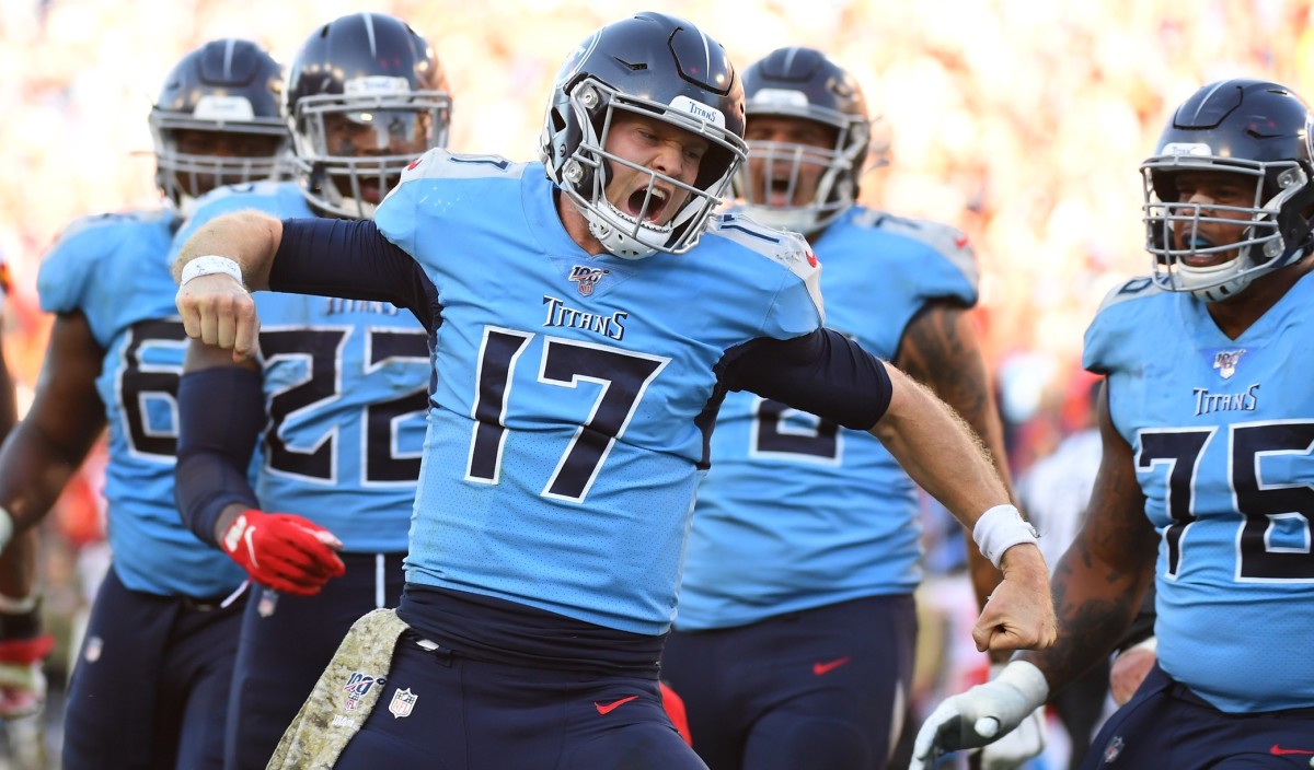 Tennessee Titans quarterback Ryan Tannehill (17) celebrates after scoring on a two-point conversion in the fourth quarter before beating the Kansas City Chiefs at Nissan Stadium.