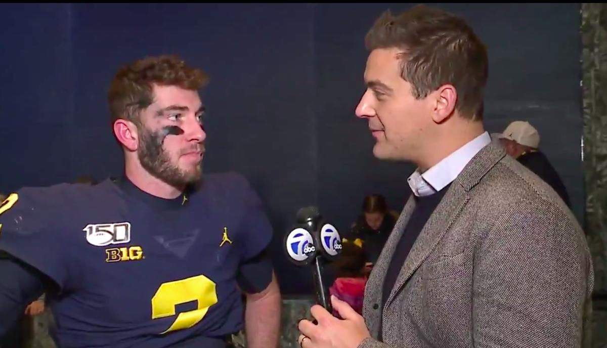 Michigan quarterback Shea Patterson (left) is interviewed on WXYZ-TV in Detroit after last Saturday's 44-10 win over in-state rival Michigan State.