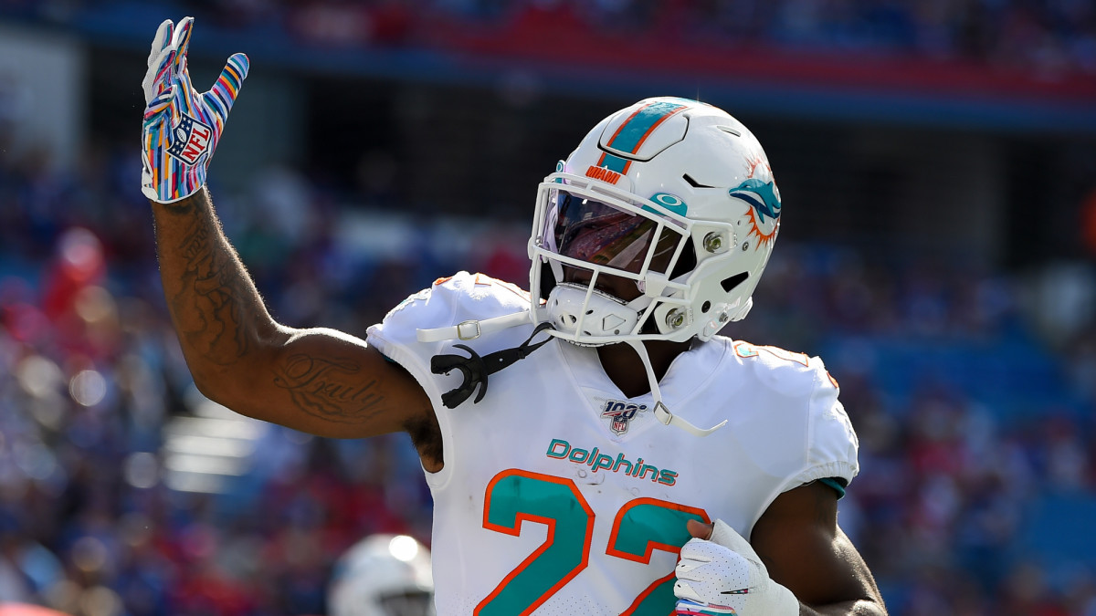 Miami Dolphins running back Mark Walton waves to the crowd prior to the game against the Buffalo Bills.