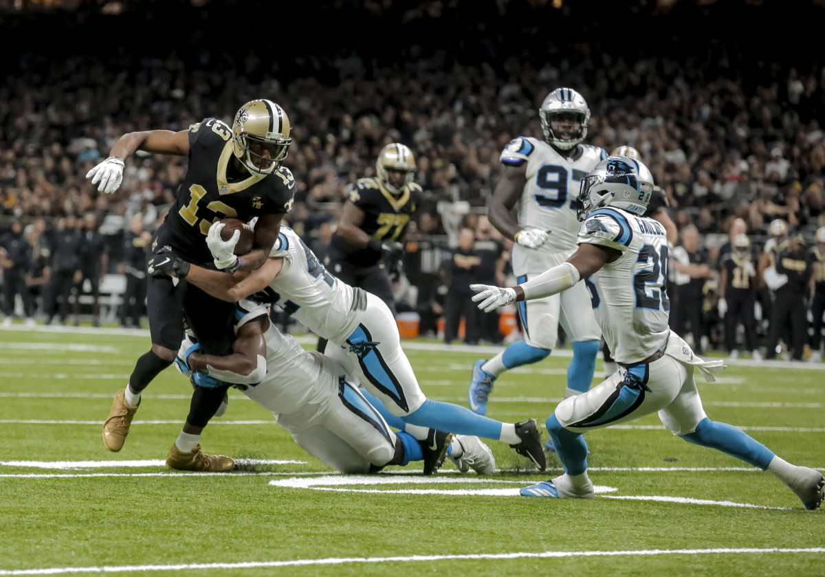 Dec 30, 2018; New Orleans, LA, USA; New Orleans Saints wide receiver Michael Thomas (13) breaks a franchise record for receiving yards in a season on a catch against the Carolina Panthers during the fourth quarter at the Mercedes-Benz Superdome. Mandatory Credit: Derick E. Hingle-USA TODAY Sports