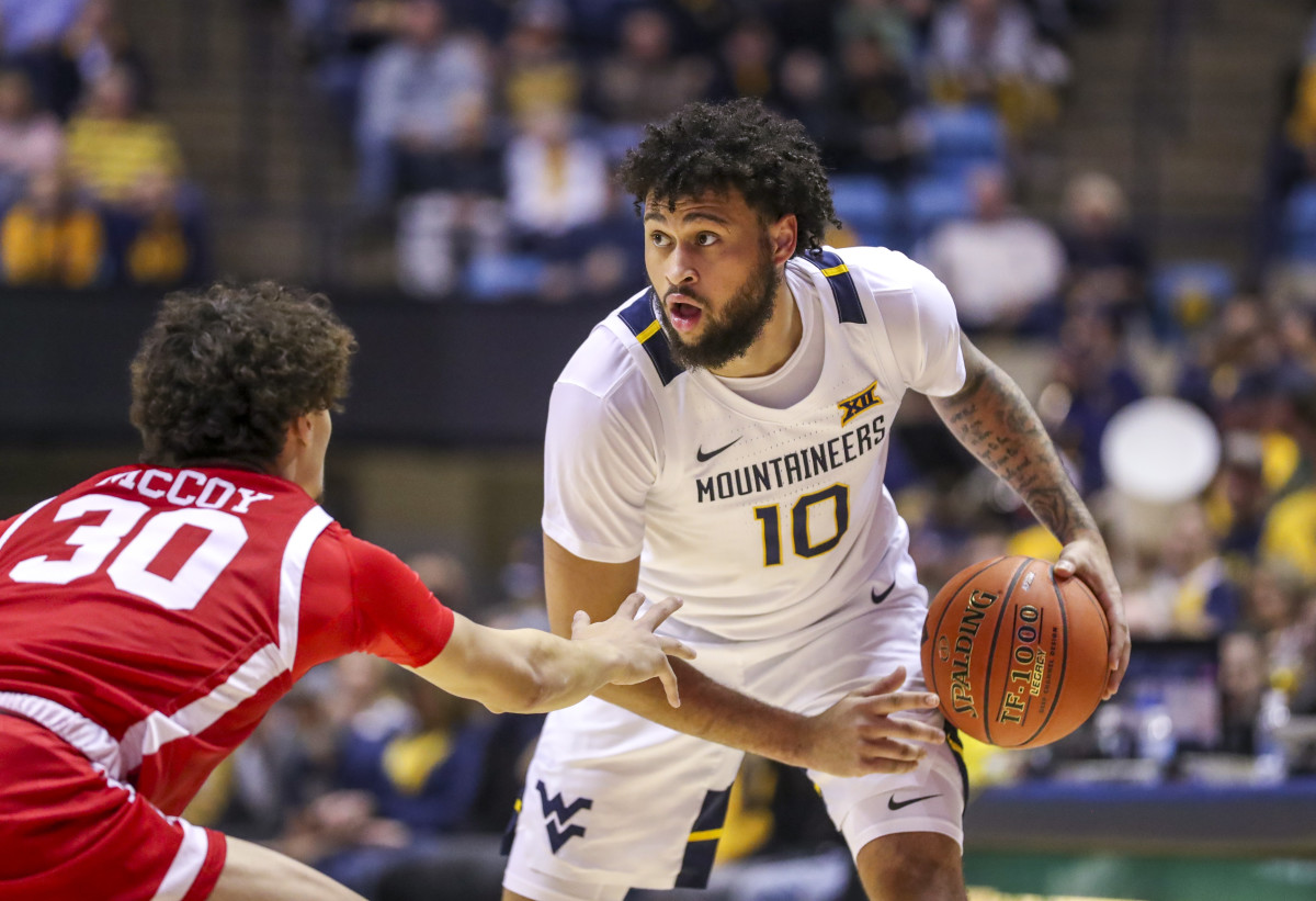 West Virginia Mountaineers guard Jermaine Haley (10) looks to pass during the second half against the Boston University Terriers at WVU Coliseum.