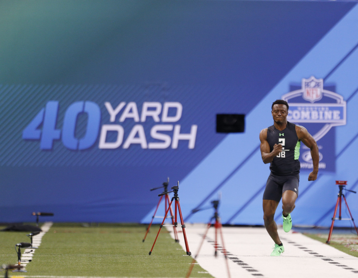 Feb 29, 2016; Indianapolis, IN, USA; Ohio State Buckeyes defensive back Eli Apple runs the 40 yard dash during the 2016 NFL Scouting Combine