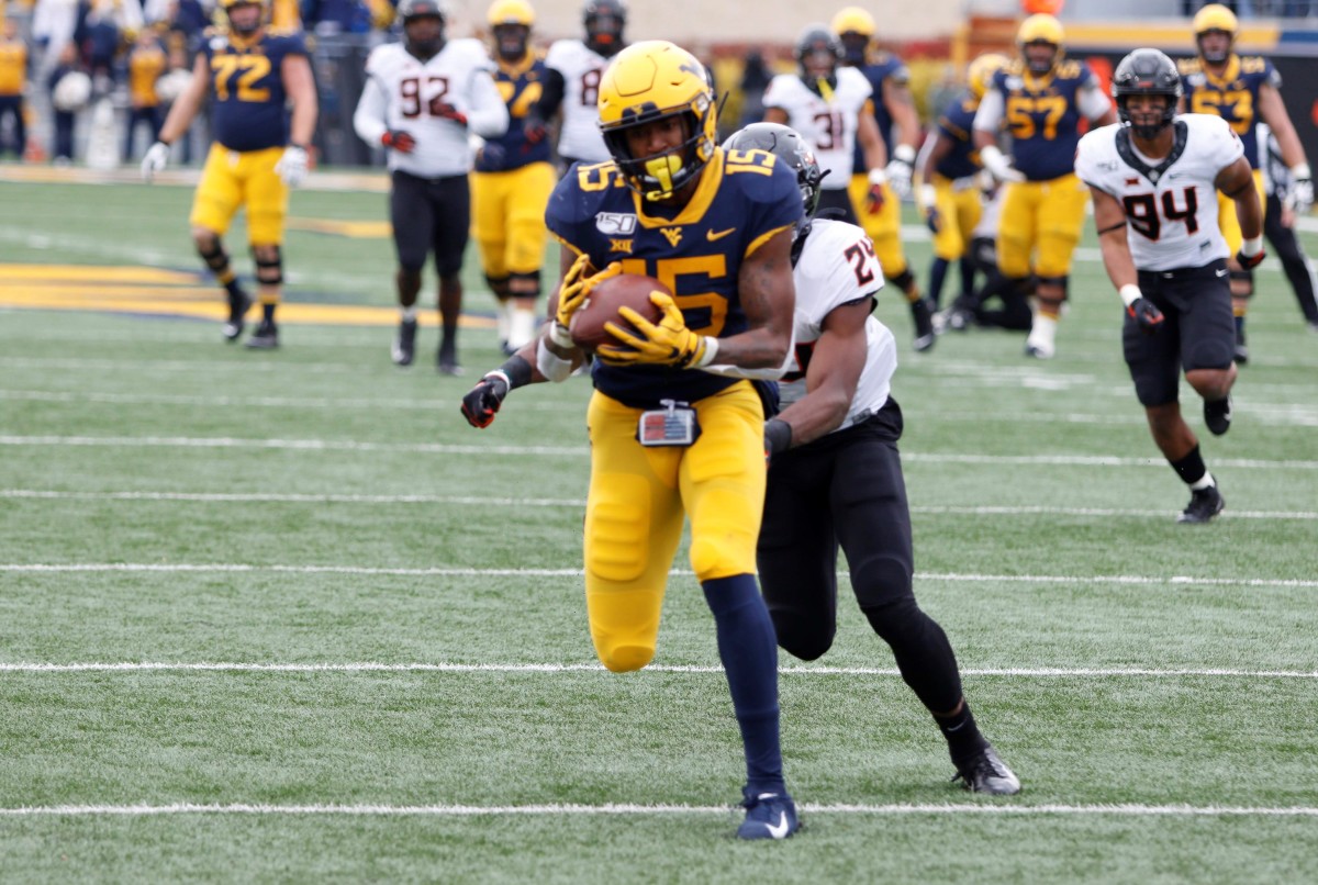 West Virginia wide receiver George Campbell hauls in a 34-yard touchdown pass from Jarrett Doege