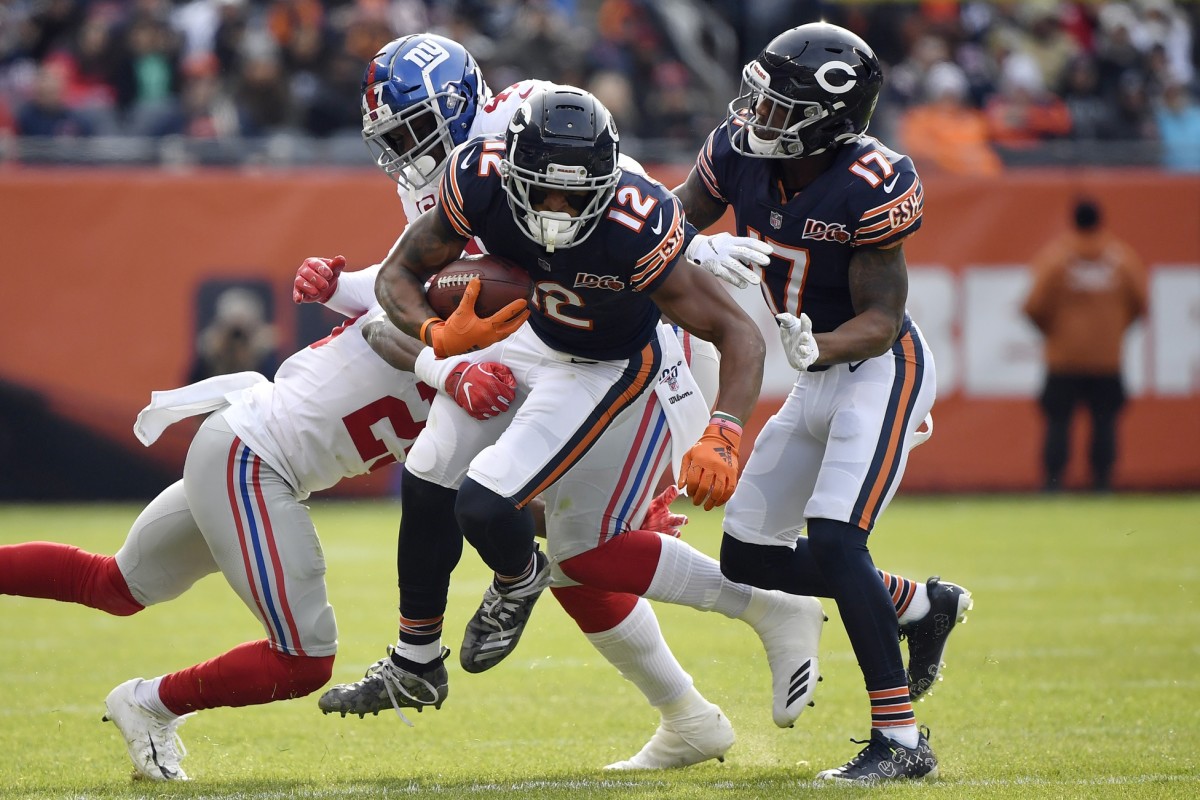 Nov 24, 2019; Chicago, IL, USA; Chicago Bears wide receiver Allen Robinson (12) runs the football for a first down in the first half against the New York Giants at Soldier Field.