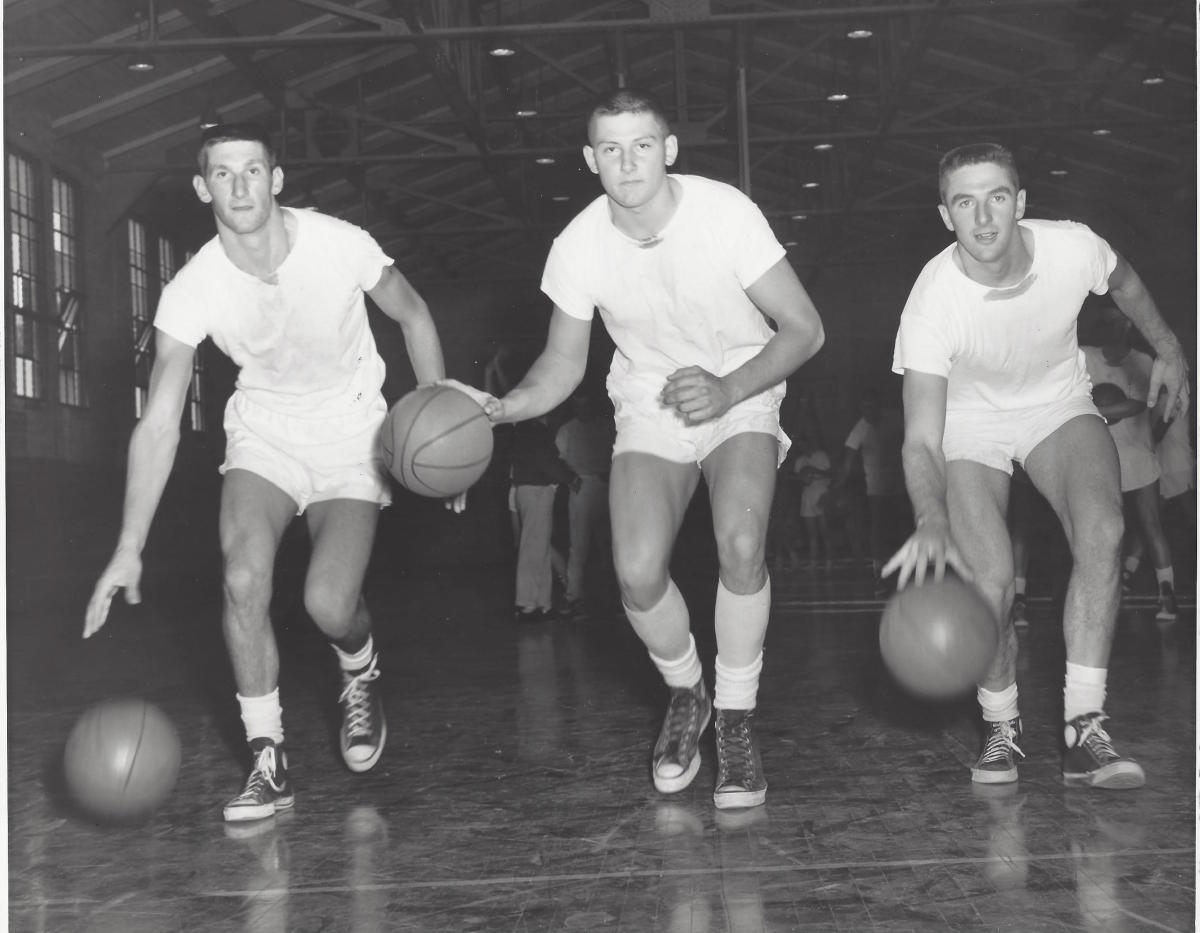 Doug Smart (center), a 1950s Washington basketball standout, died on Nov. 17. He's shown with Bruno Boin (left) and Earl Irvine.