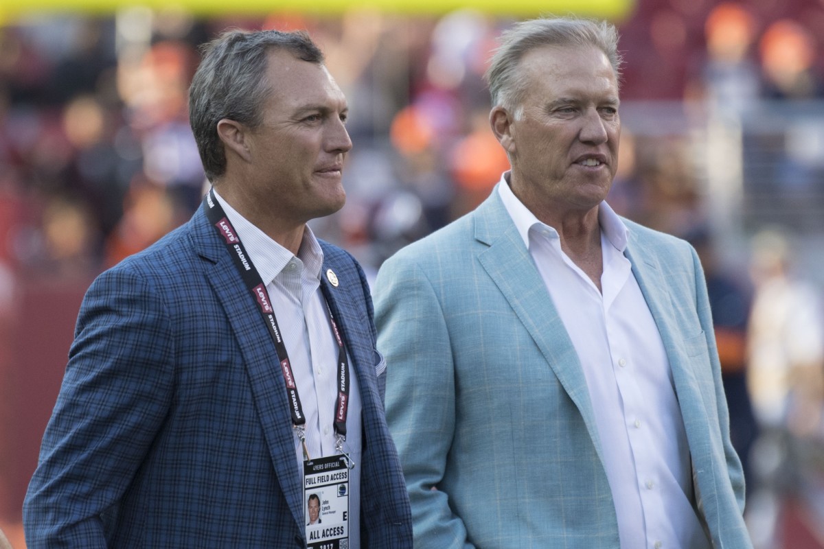 San Francisco 49ers general manager John Lynch (left) and Denver Broncos general manager John Elway (right) before the game at Levi's Stadium.