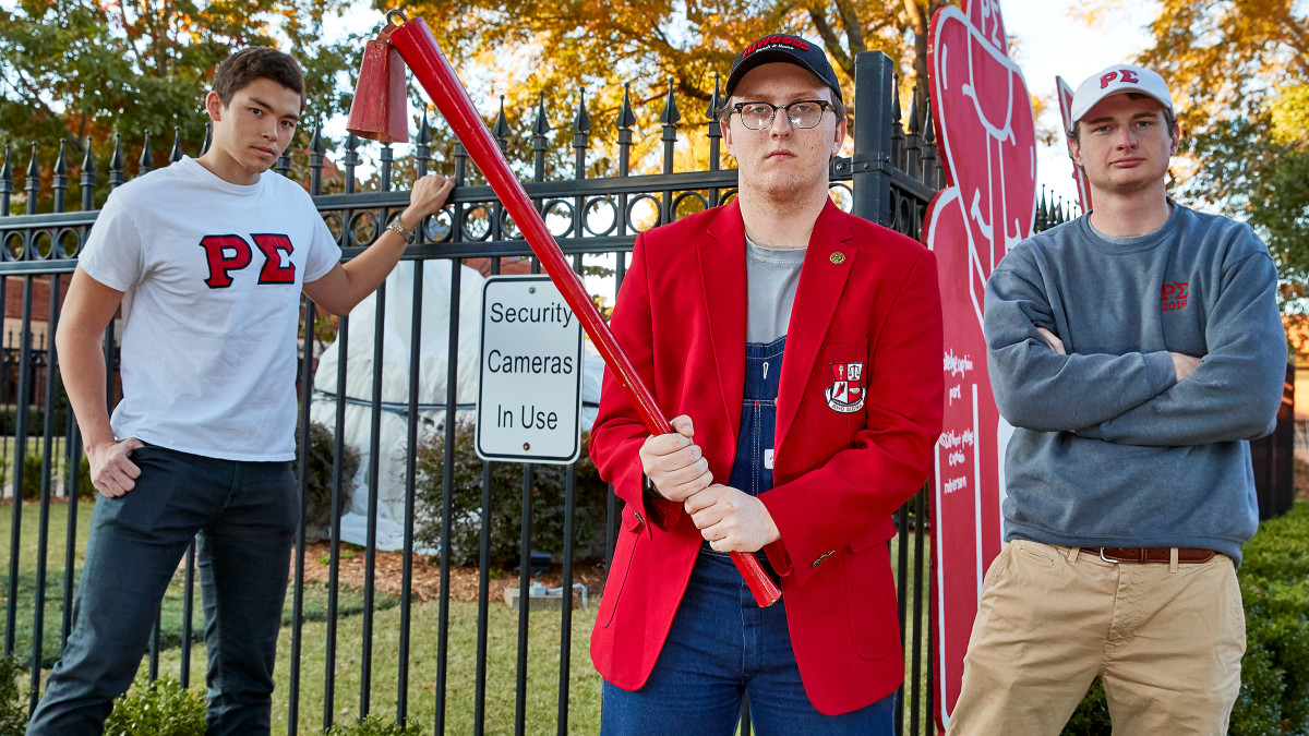 Roberson and Rho Sigma at the ready, with their Reddies stick.