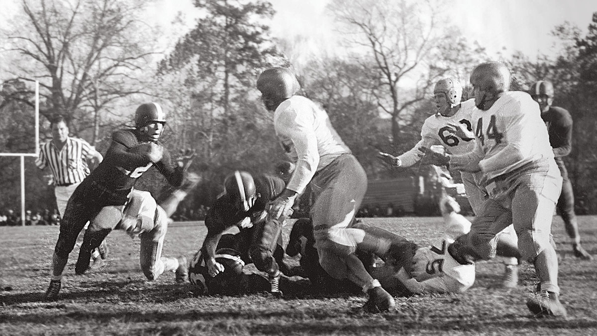 Henderson carrying against Ouachita in 1950.