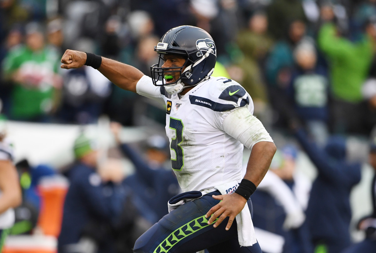 Seattle Seahawks quarterback Russell Wilson (3) reacts after a 58 yard touchdown run in the fourth quarter at Lincoln Financial Field.