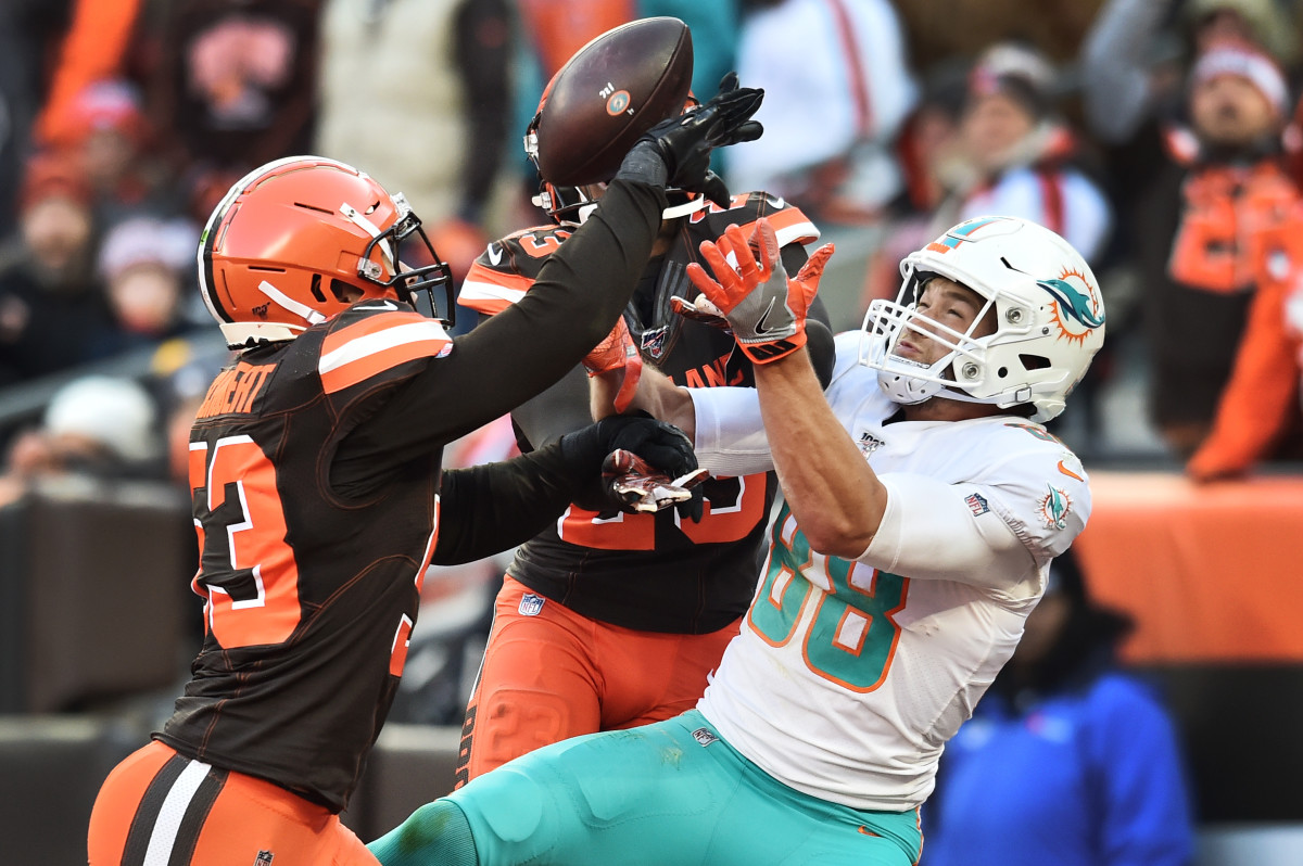 Nov 24, 2019; Cleveland, OH, USA; Cleveland Browns middle linebacker Joe Schobert (53) and free safety Damarious Randall (23) defend the pass intended for Miami Dolphins tight end Mike Gesicki (88) during the second half at FirstEnergy Stadium. Mandatory Credit: Ken Blaze-USA TODAY Sports