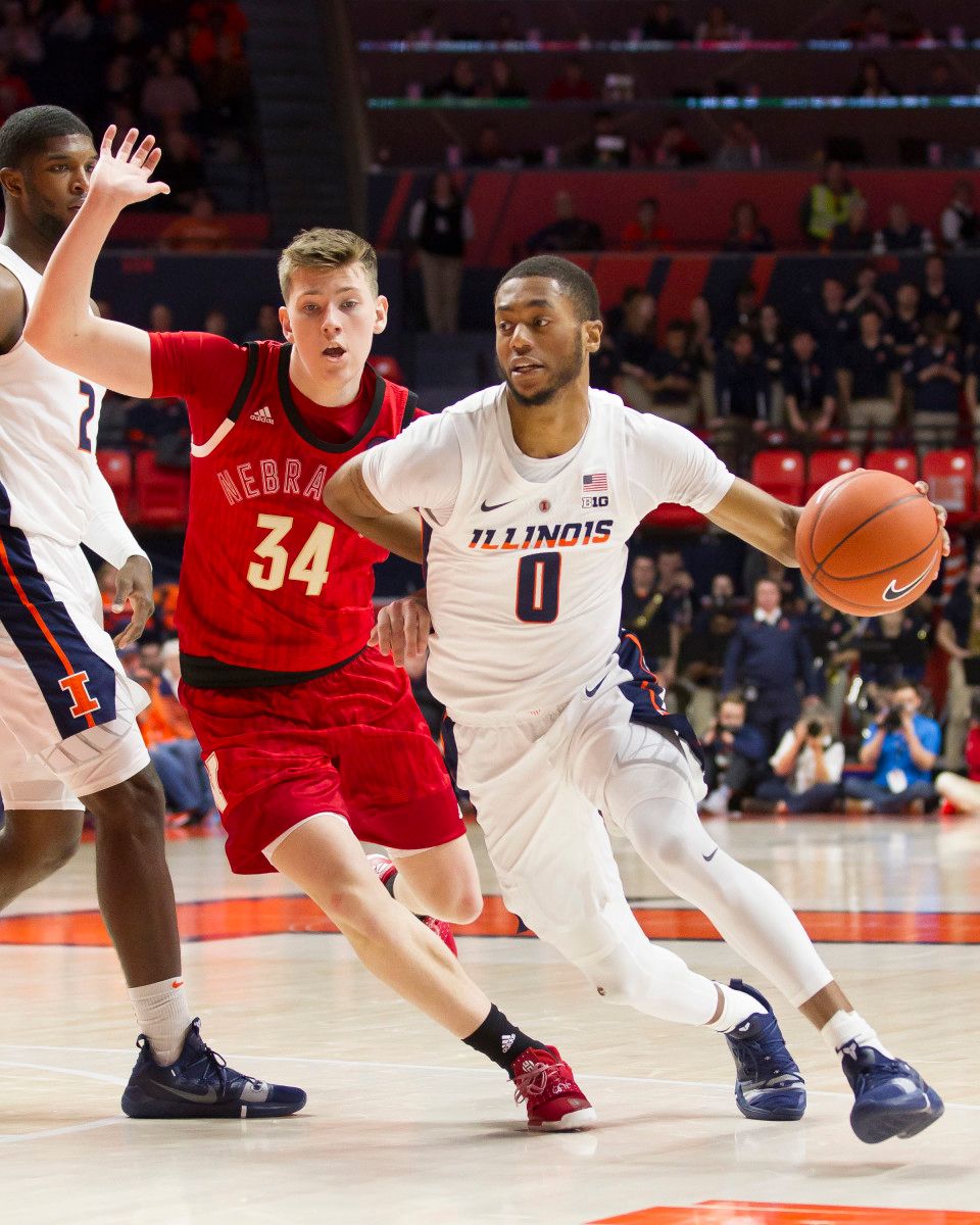Illinois guard Alan Griffin (0) drives to the basket defended by Nebraska guard Thorir Thorbjarnarson (34) during the first half at State Farm Center.