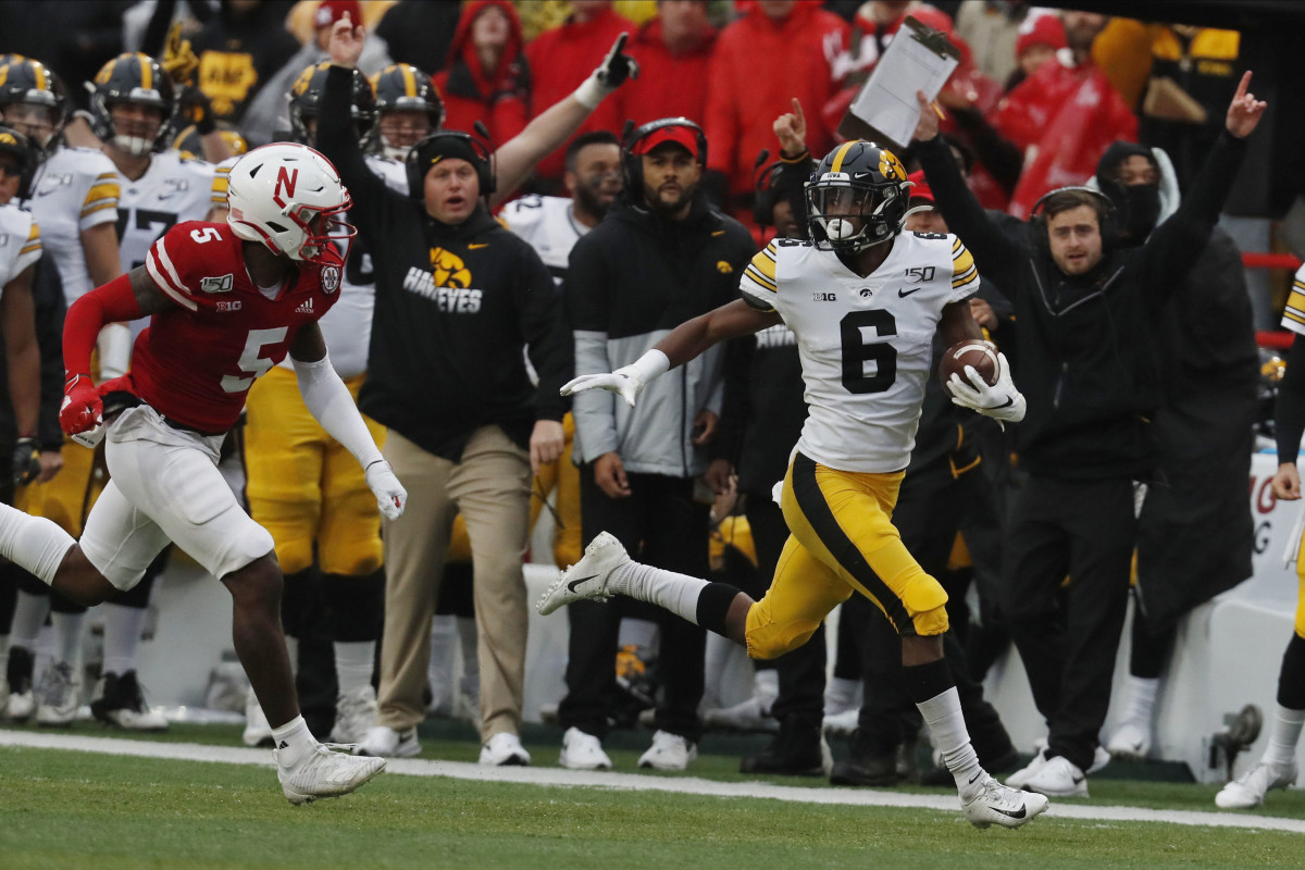 Iowa's Ihmir Smith-Marsette returns a kickoff 95 yards for a touchdown in Friday's game against Nebraska.