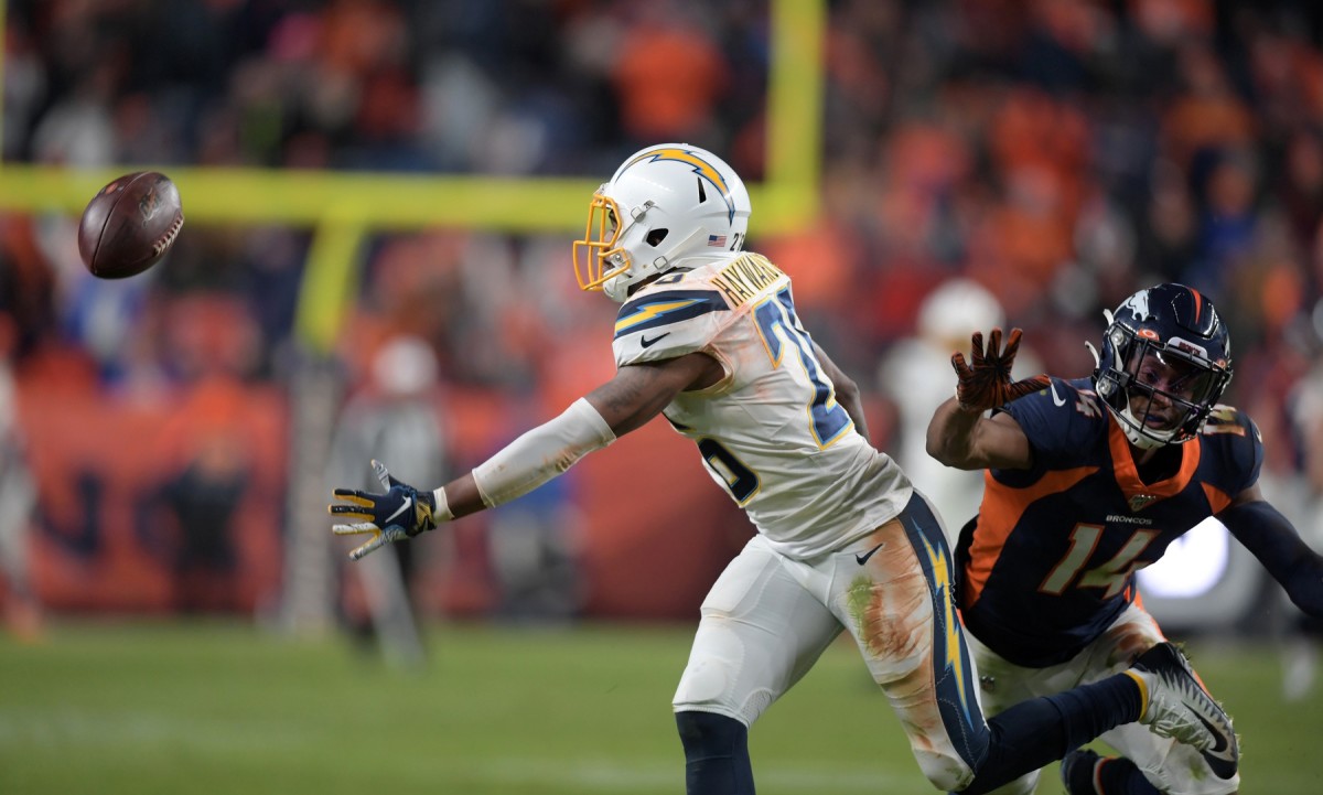 Los Angeles Chargers cornerback Casey Hayward (26) is whistled for pass interference against Denver Broncos wide receiver Courtland Sutton (14) with three seconds left at Empower Field at Mile High.The Broncos defeated the Chargers 23-20.