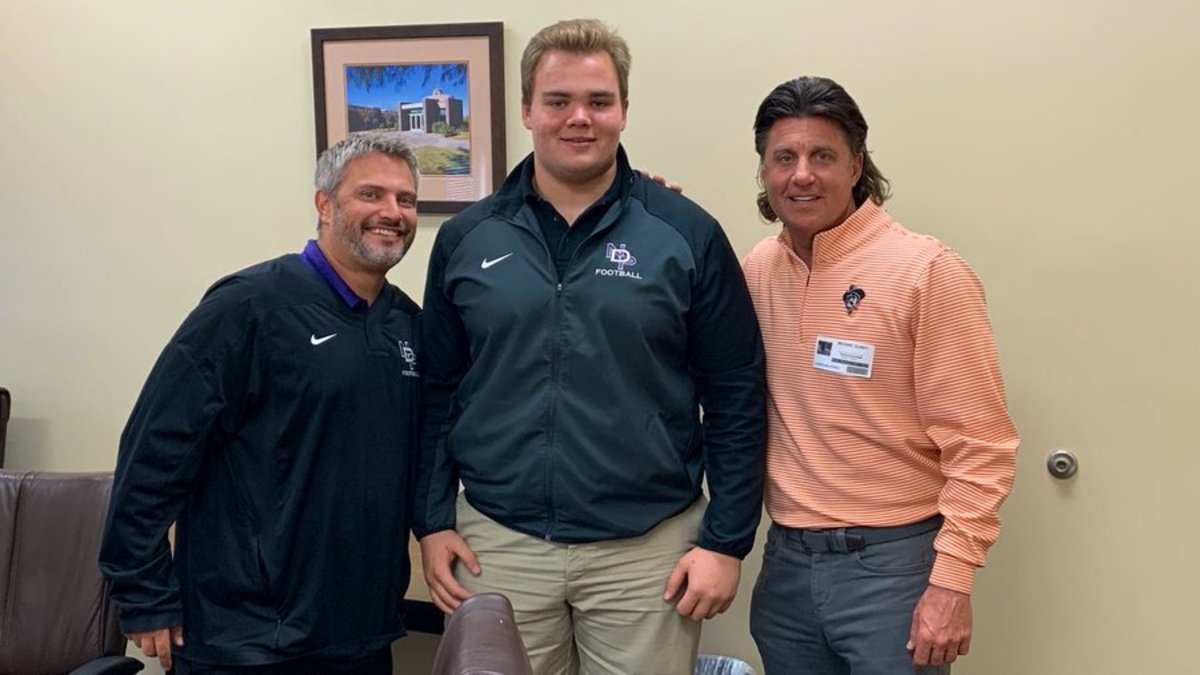 Notre Dame Prep head coach George Prelock, Oklahoma State commitment Cade Bennett, and Cowboys head coach Mike Gundy