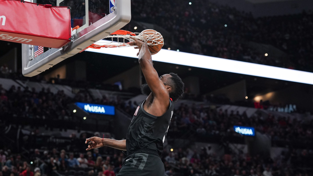 Rockets' James Harden dunks the ball vs. Spurs