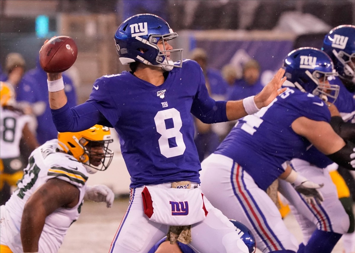 Dec 1, 2019; East Rutherford, NJ, USA; New York Giants quarterback Daniel Jones (8) throws in the 4th quarter against the Packers at MetLife Stadium.