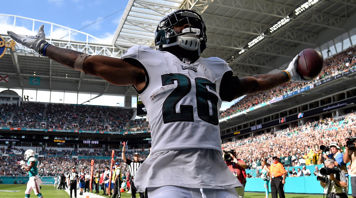 Dec 1, 2019; Miami Gardens, FL, USA; Philadelphia Eagles running back Miles Sanders (26) scores a touchdown in the first half against the Miami Dolphins at Hard Rock Stadium. Mandatory Credit: Steve Mitchell-USA TODAY Sports